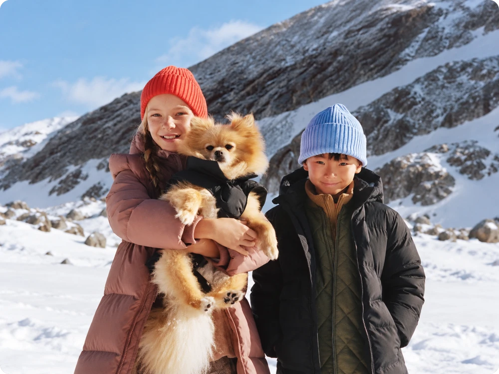 Winter portrait expanded to reveal the surrounding snowy mountains
